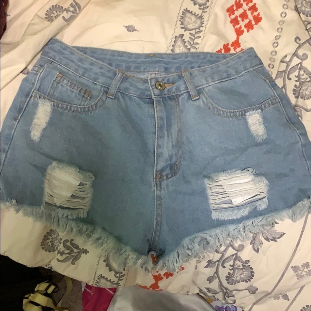 Distressed denim shorts